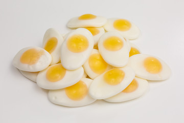 heap of gummy candy fried egg sunny side up