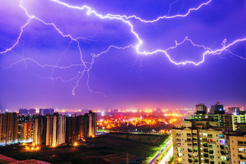 Multiple lighting bolts thunder  during a storm with a dramatic sky in noida, delhi India  - Image