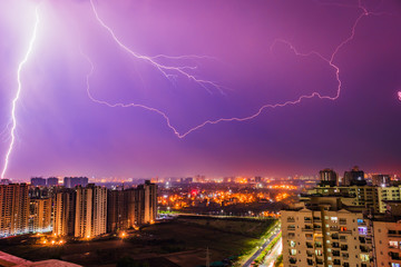 Multiple lighting bolts thunder  during a storm with a dramatic sky in noida, delhi India  - Image