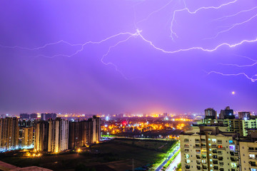 Multiple lighting bolts thunder  during a storm with a dramatic sky in noida, delhi India  - Image