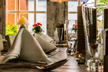 Restaurant table ready for the guests with beautiful lights