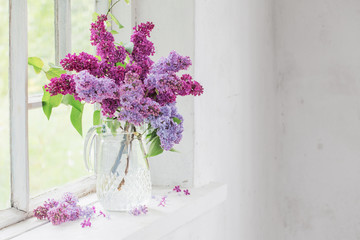 bouquet of lilacs in a glass jug