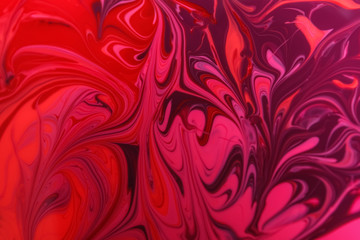 Mixed different color nail polishes as background, closeup