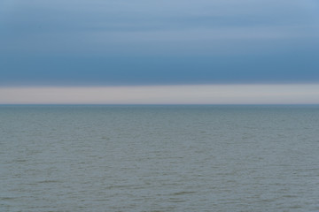 Stormy lake and cloudy sky