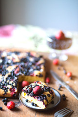 Delicious Breakfast, homemade cakes, summer concept. Berry blueberry pie with strawberry