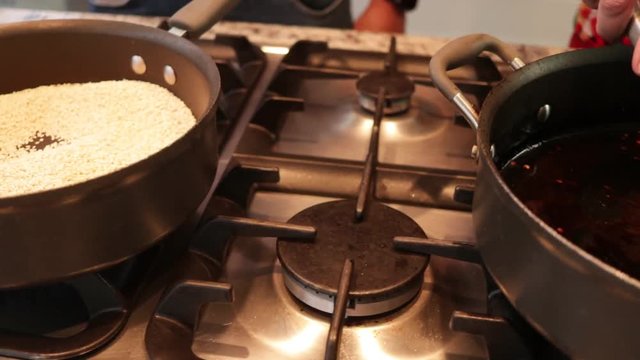 Top view. Sesame Seeds in the pot. Preparing Mole from Puebla, Mexico. North America. Cooking Traditional recipe