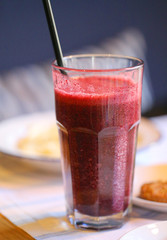 Delicious strawberry smoothie drink in a glass