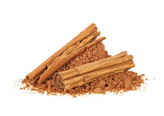 Aromatic cinnamon sticks and powder on a white background