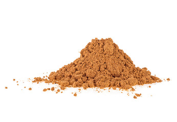Cinnamon powder isolated on a white background. Full depth of field.
