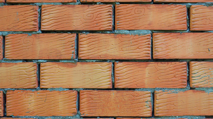 orange brick wall for background