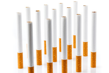 Tobacco smoking. Cigarette close up, isolated on white background.  Bad habit. Nicotine. Drug addiction. Cancer.