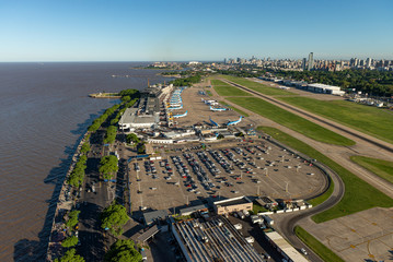 Aerial image showing the full Aeroparque Internacional Ing. Jorge Alejandro Newbery at the river...