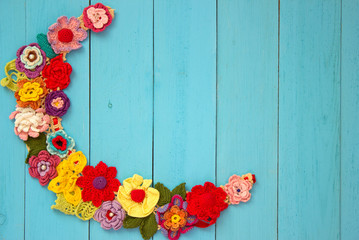 A knitted necklace of colorful flower