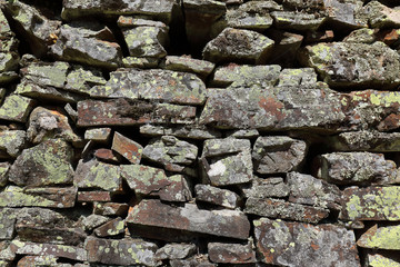 Stone wall, wall of an old house.