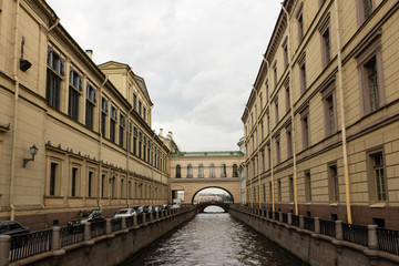Fototapeta na wymiar Winter Canal - a canal in Saint Petersburg, Russia, connecting Bolshaya Neva with Moika River in the vicinity of Winter Palace.