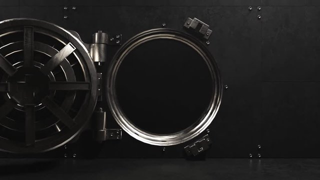 The camera moves to the right in the bank vault. The door opens a huge safe