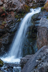 Gveleti Big Waterfalls in a Dariali Gorge near the Kazbegi city in the mountains of the Caucasus, Geprgia