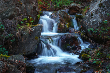 Scenic waterfall view in Dariali gorge in autumn, Gveleti waterfall, Georgia