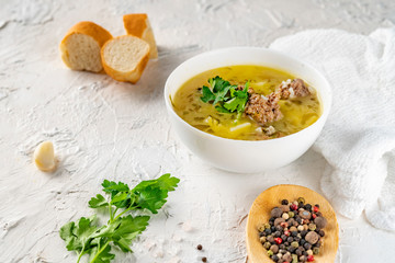 healthy soup eating for dinner meal on a white concrete background with ingredient