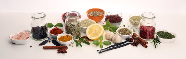 Spices and herbs on table. Food and cuisine ingredients with basil