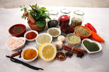 Spices and herbs on table. Food and cuisine ingredients with basil