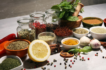Spices and herbs on table. Food and cuisine ingredients with basil