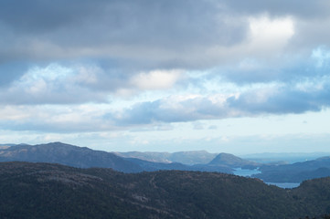 Mountain Ridge with dramatic clouds and skies and sun beams