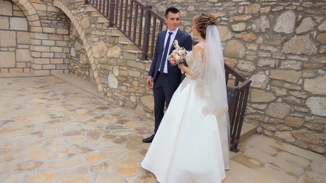 Wedding couple. Lovely bride and groom. Happy family. Man and woman in love. Wedding day. Posing for a photo. SDE. Love story. Wedding day.