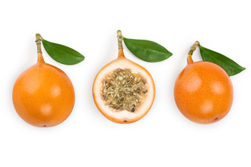 Granadilla or yellow passion fruit with leaf isolated on white background. Top view. Flat lay