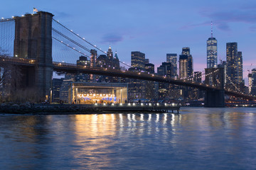 Brooklyn Bridge at night view from Brooklyn neighborhood, Manhattan, New York.