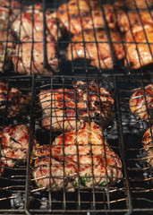 grilled pork are cooked outdoors; summer picnic; close-u
