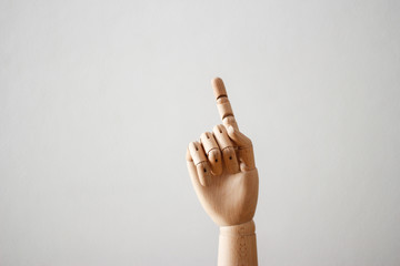 Articulated wood hand on white background