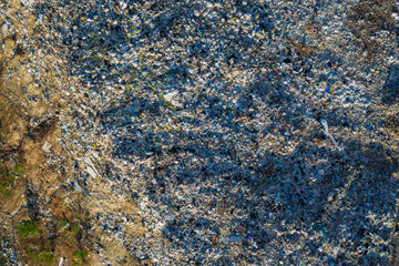 Aerial view of garbage dump. Top view of plastic waste and different trash