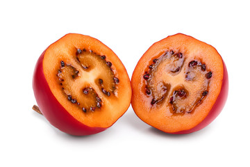 Fresh tamarillo half fruit isolated on white background