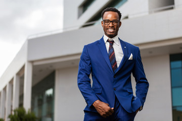 Outdoor standing portrait of a black African American business man