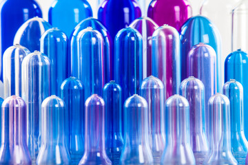 The various type of plastic bottle product and preform material with white background