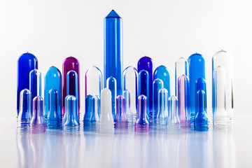 The various type of plastic bottle product and preform material with white background