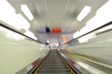 subway escalator motion speed, tunnel perspective