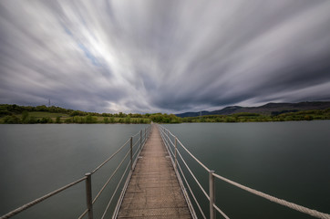 Footbridge to nowhere, end point, next step,water