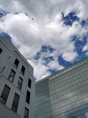 building with blue sky and clouds