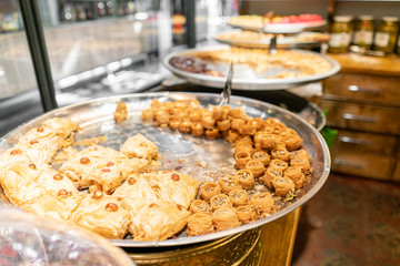 Variety of sweets Pastry. Traditional Eastern dessert Eastern sweets in a wide range, baklava, almond, cashew and pistachio nuts.