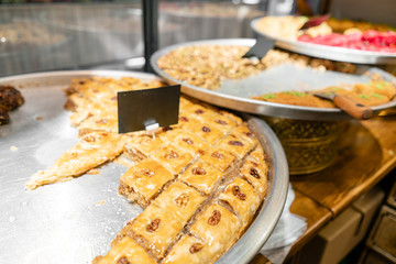 Variety of sweets Pastry. Traditional Eastern dessert Eastern sweets in a wide range, baklava, almond, cashew and pistachio nuts.