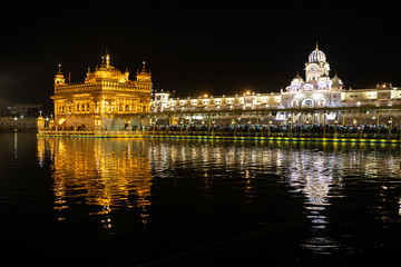 	 Night view to the Golden temple (Harmandir sahib) with reflection in Amritsar, Punjab, India