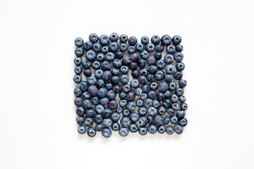 Blueberries on white background. Flat lay berries. Top view