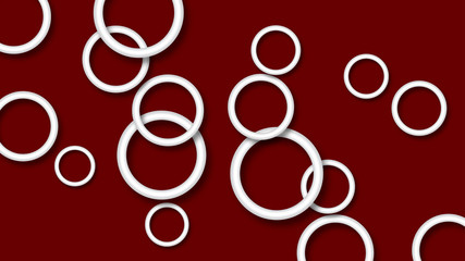 Abstract illustration of randomly arranged white rings with soft shadows on burgundy background