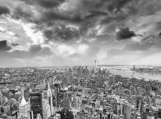 Tall skyscrapers of Midtown Manhattan, night aerial view