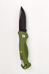 Green military jacknife. Vertical pocket knife on white isolated background.