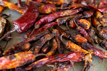 Dry and old chili peppers. Spoiled pepper