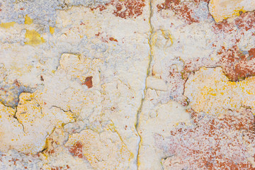 Texture of cracked paint. Background of old painted wall. Pattern with cracked paint pieces. Retro wallpaper