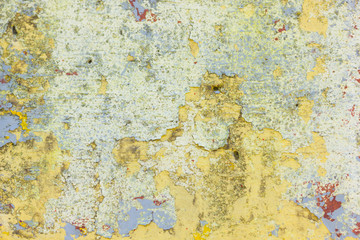 Texture of cracked paint. Background of old painted wall. Pattern with cracked paint pieces. Retro wallpaper